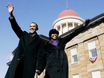 ** FILE ** In this Feb. 10, 2007 file photo, then Sen. Barack Obama, D-Ill. and his wife Michelle wave to the crowd after he announced his candidacy for president of the United States at the Old State Capitol in Springfield, Ill.  (AP Photo/Charles Rex Arbogast, File)