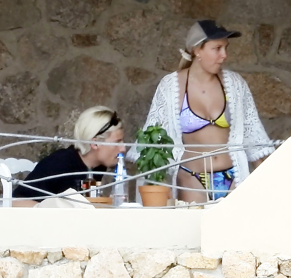 *EXCLUSIVE* 'Stranger Things' actress Millie Bobby Brown sports a ring while enjoying her getaway with boyfriend Jake Bongiovi in Sardinia