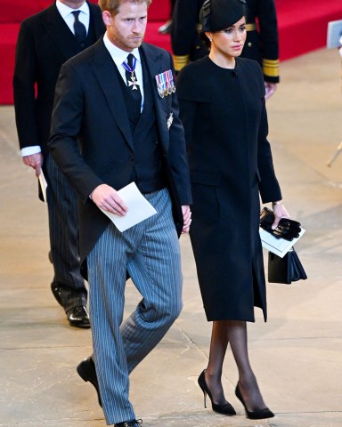 Prince Harry and Meghan Duchess of SussexQueen Elizabeth II's coffin procession from Buckingham Palace to Westminster Hall, London, UK - 14 Sep 2022