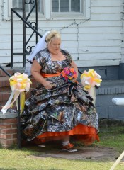 Honey Boo Boo's Mama June Shannon gets married to Sugar Bear in Georgia. June Shannon weds Sugar Bear in a redneck wedding in the country of Atlanta outside their home. The groomsmen wore camo wedding attire.

Pictured: Honey Boo Boo's Mama June Shannon marries Sugar Bear
Ref: SPL534125 050513 NON-EXCLUSIVE
Picture by: SplashNews.com

Splash News and Pictures
USA: +1 310-525-5808
London: +44 (0)20 8126 1009
Berlin: +49 175 3764 166
photodesk@splashnews.com

World Rights