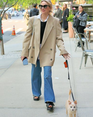 Naomi Watts shows off what appears to be an engagement ring outside the Greenwich Hotel while walking her dog in New York City. Naomi then appears to hide the ring by covering it with her cellphone.

Pictured: Naomi Watts
Ref: SPL5542870 260423 NON-EXCLUSIVE
Picture by: Christopher Peterson / SplashNews.com

Splash News and Pictures
USA: +1 310-525-5808
London: +44 (0)20 8126 1009
Berlin: +49 175 3764 166
photodesk@splashnews.com

World Rights