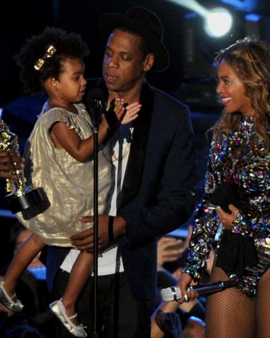 LOS ANGELES, CA - AUGUST 24 : (L-R) Blue Ivy, Jay Z and Beyonce onstage at the 2014 MTV Video Music Awards at The Forum on August 24, 2014 in Los Angeles, California. fmpg/MediaPunch/IPX