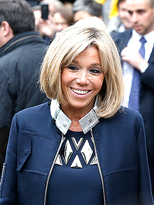 Brigitte, the wife of French independent centrist presidential candidate, Emmanuel Macron smiles after casting her vote in Le Touquet, France, . Voters across France are choosing a new president in an unusually tense and important election that could decide Europe's future, making a stark choice between pro-business progressive Emmanuel Macron and far-right populist Marine Le PenElection, Le Touquet, France - 07 May 2017