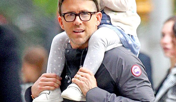 Ryan Reynolds giving 2-year-old daughter James a piggy-back ride in NYC