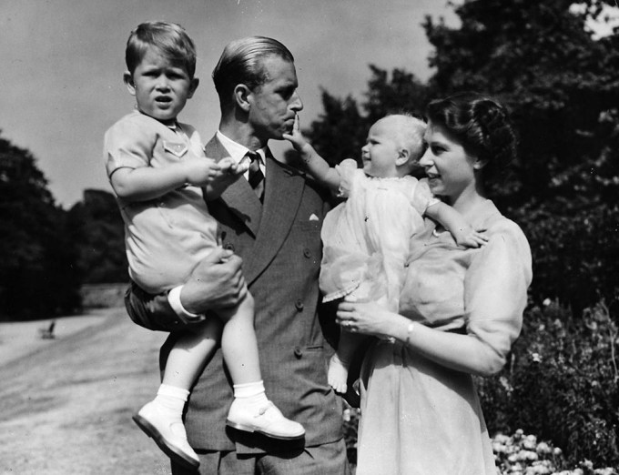 Queen Elizabeth & Prince Philip Cradle Charles & Anne