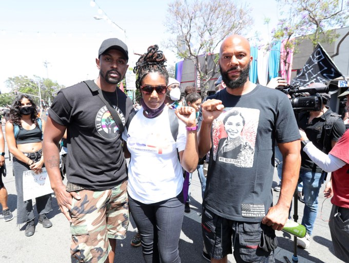 Tiffany Haddish and Common at a protest