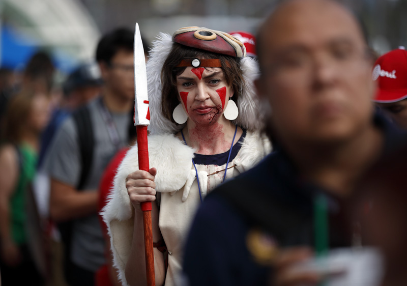 Rebecca Miller waits in line for the first day of Comic-Con, in San Diego. Comic-Con, which started as a comic-book convention with 300 participants in 1970 and has grown into a corporate-heavy media showcase that draws more than 130,000 attendees, runs through Sunday in San DiegoComic Con, San Diego, USA - 20 Jul 2017