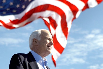 FILE - In this Nov. 3, 208 file photo, Republican presidential candidate Sen. John McCain, R-Ariz. speaks at a rally outside Raymond James Stadium in Tampa, Fla. President Donald Trump is not backing down from his longstanding criticism of the late Sen. John McCain. Trump declared Tuesday at the White House: “I was never a fan of John McCain and I never will be.” Trump drew criticism over the weekend for tweeting insults at McCain, a Vietnam war hero, Arizona senator and 2008 Republican presidential candidate who died last year of brain cancer. (AP Photo/Carolyn Kaster)