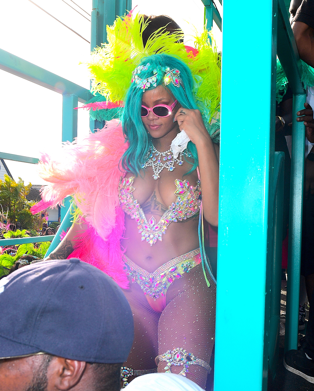 Rihanna was spotted partying hard at Cropover Festival Kadooment Day in Barbados . She looked amazing with a Blue Wig, and a Bejeweled Costume . She wore colorful feather headers as she waved to fans along the parade route. She seemed to be having an amazing time. Lewis Hamilton on the other hand, tried to get on the same float as his rumored ex, and she wanted no part. Him and his crew were forced to walk behind in the middle of the street.Pictured: Rihanna,Lewis Hamilton,RihannaLewis HamiltonRef: SPL1552165 070817 NON-EXCLUSIVEPicture by: SplashNews.comSplash News and PicturesLos Angeles: 310-821-2666New York: 212-619-2666London: +44 (0)20 7644 7656Berlin: +49 175 3764 166photodesk@splashnews.comWorld Rights