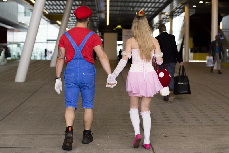 Cosplay fans dressed as Mario and Princess Peach leave London Comic Con
MCM London Comic Con, Britain - 23 Oct 2015
2015 MCM London Comic Con is being held at London's ExCel Arena. The event will be host to more than 110,000 comic fans and cosplay enthusiasts over the weekend.