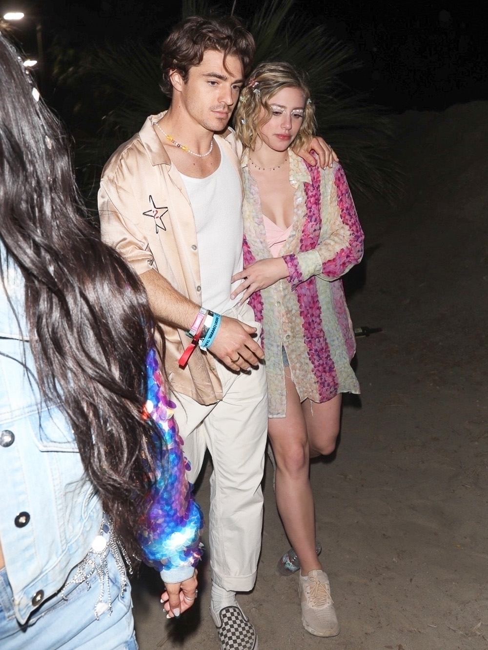 Indio, CA  - Lili Reinhart and new boyfriend couple up at Coachella's Neon Carnival.

Pictured: Lili Reinhart

BACKGRID USA 17 APRIL 2022 

BYLINE MUST READ: Mr. Bueno / BACKGRID

USA: +1 310 798 9111 / usasales@backgrid.com

UK: +44 208 344 2007 / uksales@backgrid.com

*UK Clients - Pictures Containing Children
Please Pixelate Face Prior To Publication*