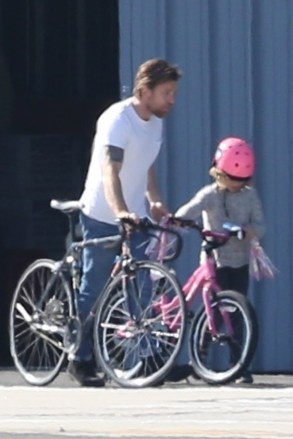 Los Angeles, CA  - Ewan McGregor takes his daughter Anouk for a quick bike ride at the Santa Monica airport. The 'Fargo' star rides around with his young daughter as she takes a spill, before pulling out his classic ride for a weekend cruise.

Pictured: Ewan Mcgregor

BACKGRID USA 25 FEBRUARY 2018 

USA: +1 310 798 9111 / usasales@backgrid.com

UK: +44 208 344 2007 / uksales@backgrid.com

*UK Clients - Pictures Containing Children
Please Pixelate Face Prior To Publication*