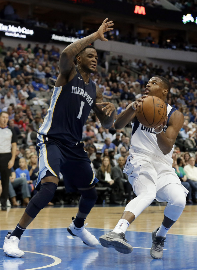 Dennis Smith Jr., Jarell Martin. Memphis Grizzlies' Jarell Martin, left, defends as Dallas Mavericks guard Dennis Smith Jr., right, attempts to take a shot during an NBA basketball game, in Dallas
Grizzlies Mavericks Basketball, Dallas, USA - 25 Oct 2017