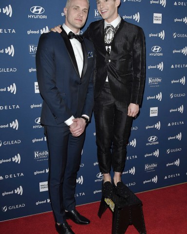 (L-R) Jussi-Pekka Kajaala and Adam Rippon at the 30th Annual GLAAD Media Awards held at the Beverly Hilton in Beverly Hills, CA on Thursday, March 28, 2019. (Photo By Sthanlee B. Mirador/Sipa USA)(Sipa via AP Images)