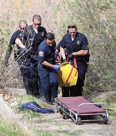 Mark Salling Commits Suicide by dry creek bed near his Home in Sun Valley California. The  Glee actor who admitted possessing child sex abuse images, found dead in an apparent suicide by Hanging from a tree, in a recreational Area by his home.

Pictured: Mark Salling's dead body
Ref: SPL1652680  300118  
Picture by: Mark Kreusch / Splash News

Splash News and Pictures
Los Angeles:310-821-2666
New York:212-619-2666
London:870-934-2666
photodesk@splashnews.com