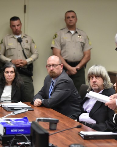 Louise Turpin (L) and attorney Jeff Moore (C) David Turpin (2-R) appear in court for arraignment on charges against the two in relation to their 13 malnourished children found chained in their home in Riverside, California, USA, 18 January 2018. The two parents were charged with multiple counts of Child abuse, torture, abuse of dependent adults and false imprisonment and could face close to 100 years to life in prison if convicted.
Charges filed in case of 13 siblings found in Perris, California home, Riverside, USA - 18 Jan 2018