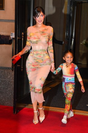 New York, NY  - Kylie Jenner looks amazing as she exits the Ritz-Carlton Hotel with her daughter Stormi to attend Jean Paul Gaultier x The Webster Celebrate the Launch of “Flower Collection” this evening in New York City.

Pictured: Kylie Jenner

BACKGRID USA 2 MAY 2023 

USA: +1 310 798 9111 / usasales@backgrid.com

UK: +44 208 344 2007 / uksales@backgrid.com

*UK Clients - Pictures Containing Children
Please Pixelate Face Prior To Publication*