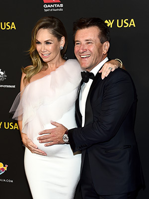 Robert Herjavec with his pregnant wife, Kym Johnson