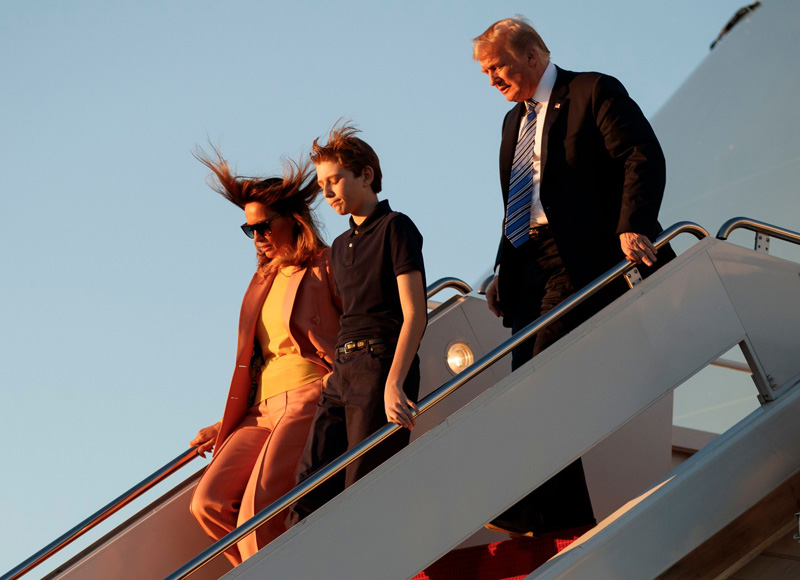 Donald Trump, Melania Trump, Barron Trump. President Donald Trump, first lady Melania Trump and their son Barron Trump, arrive on Air Force One at Palm Beach International Airport, in West Palm Beach, FlaTrump, West Palm Beach, USA - 23 Mar 2018