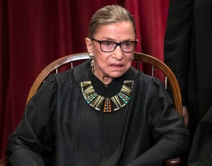 FILE - In this June 1, 2017, file photo, Associate Justice Ruth Bader Ginsburg joins other justices of the U.S. Supreme Court for an official group portrait at the Supreme Court Building in Washington. In different circumstances, Ginsburg might be on a valedictory tour in her final months on the Supreme Court. But in the era of Donald Trump, the 84-year-old Ginsburg is packing her schedule and sending signals she intends to keep her seat on the bench for years. (AP Photo/J. Scott Applewhite, File)