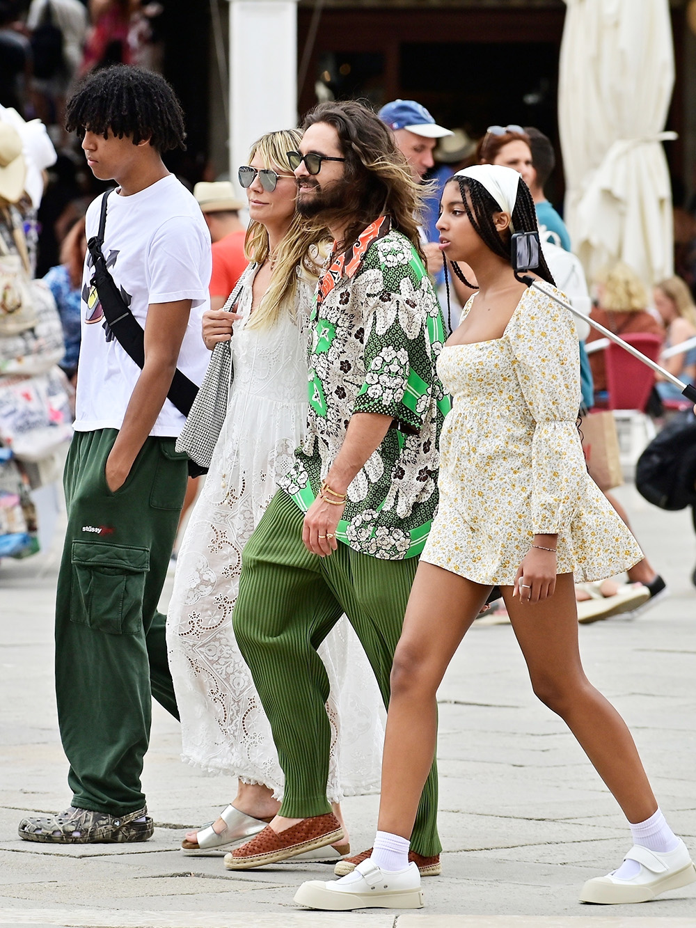 VENICE, ITALY  - *EXCLUSIVE*  - Heidi Klum and her husband, Tom Kaulitz, exude style in Venice. Tom impresses in a fashionable green ensemble, while Heidi shines in a flowing white summer dress.

PICS TAKEN: 23/06/2023

Pictured: Heidi Klum , Tom Kaulitz

BACKGRID USA 25 JUNE 2023 

BYLINE MUST READ: Cobra Team / BACKGRID

USA: +1 310 798 9111 / usasales@backgrid.com

UK: +44 208 344 2007 / uksales@backgrid.com

*UK Clients - Pictures Containing Children
Please Pixelate Face Prior To Publication*