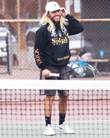 Pete Wentz is spotted with blonde hair while playing tennis in his Los Angeles neighborhood. 07 Dec 2020 Pictured: Pete Wentz is spotted with blonde hair while playing tennis in his Los Angeles neighborhood. Photo credit: MEGA TheMegaAgency.com +1 888 505 6342 (Mega Agency TagID: MEGA719812_007.jpg) [Photo via Mega Agency]