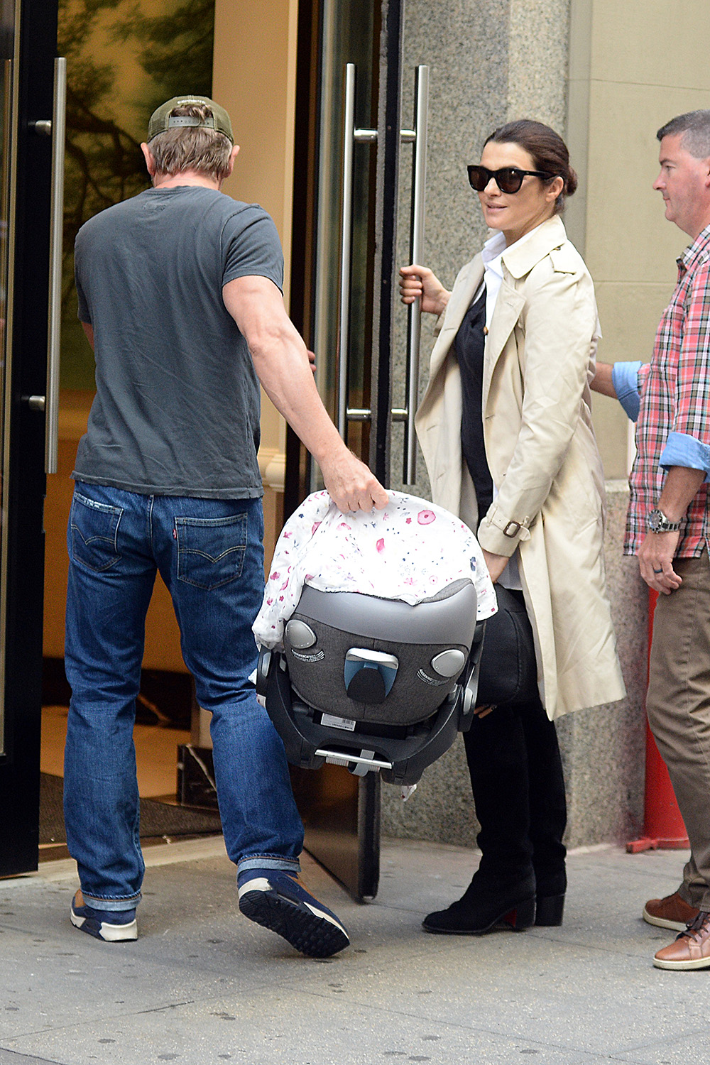 Daniel Craig and his wife Rachel Weisz spotted for the first time with their new baby girl in New York City