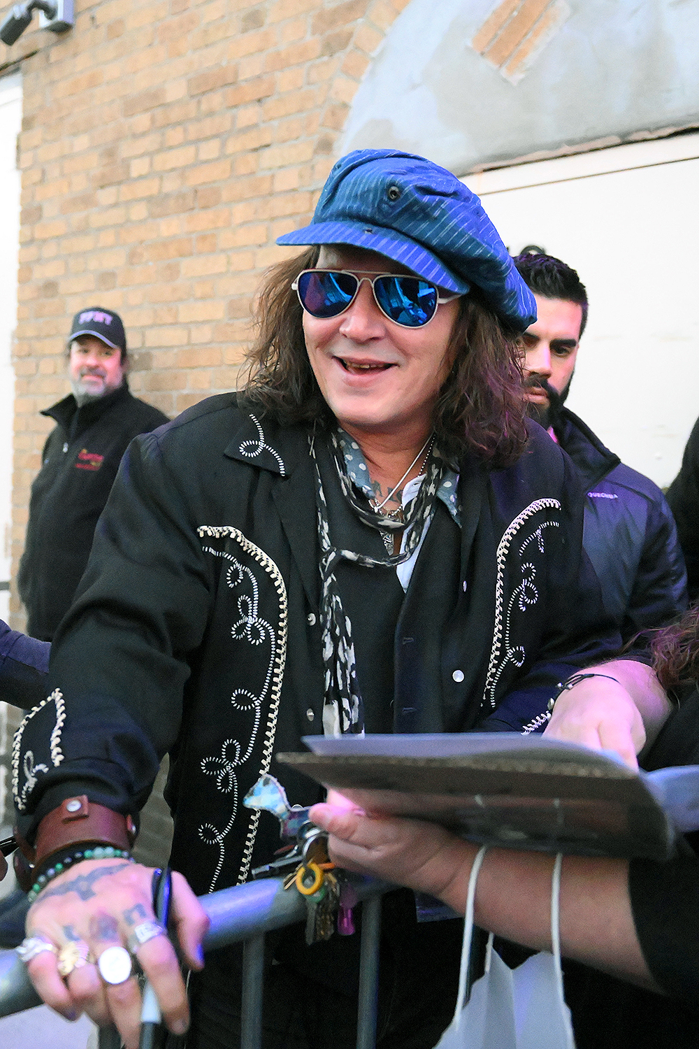 Johnny Depp is all smiles while signing autographs and posing for selfies for his fans outside the Capital Theater in Westchester, New York. Depp is on tour right now.Pictured: Johnny DeppRef: SPL5492036 081022 NON-EXCLUSIVEPicture by: Elder Ordonez / SplashNews.comSplash News and PicturesUSA: +1 310-525-5808London: +44 (0)20 8126 1009Berlin: +49 175 3764 166photodesk@splashnews.comWorld Rights, No Poland Rights, No Portugal Rights, No Russia Rights