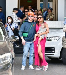 EXCLUSIVE: Priyanka Chopra and Nick Jonas seen arriving at Mumbai Airport with their baby daughter Malti Marie. 31 Mar 2023 Pictured: Priyanka Chopra and Nick Jonas seen arriving at Mumbai Airport with their baby daughter Malti Marie. Photo credit: MEGA TheMegaAgency.com +1 888 505 6342 (Mega Agency TagID: MEGA963724_001.jpg) [Photo via Mega Agency]