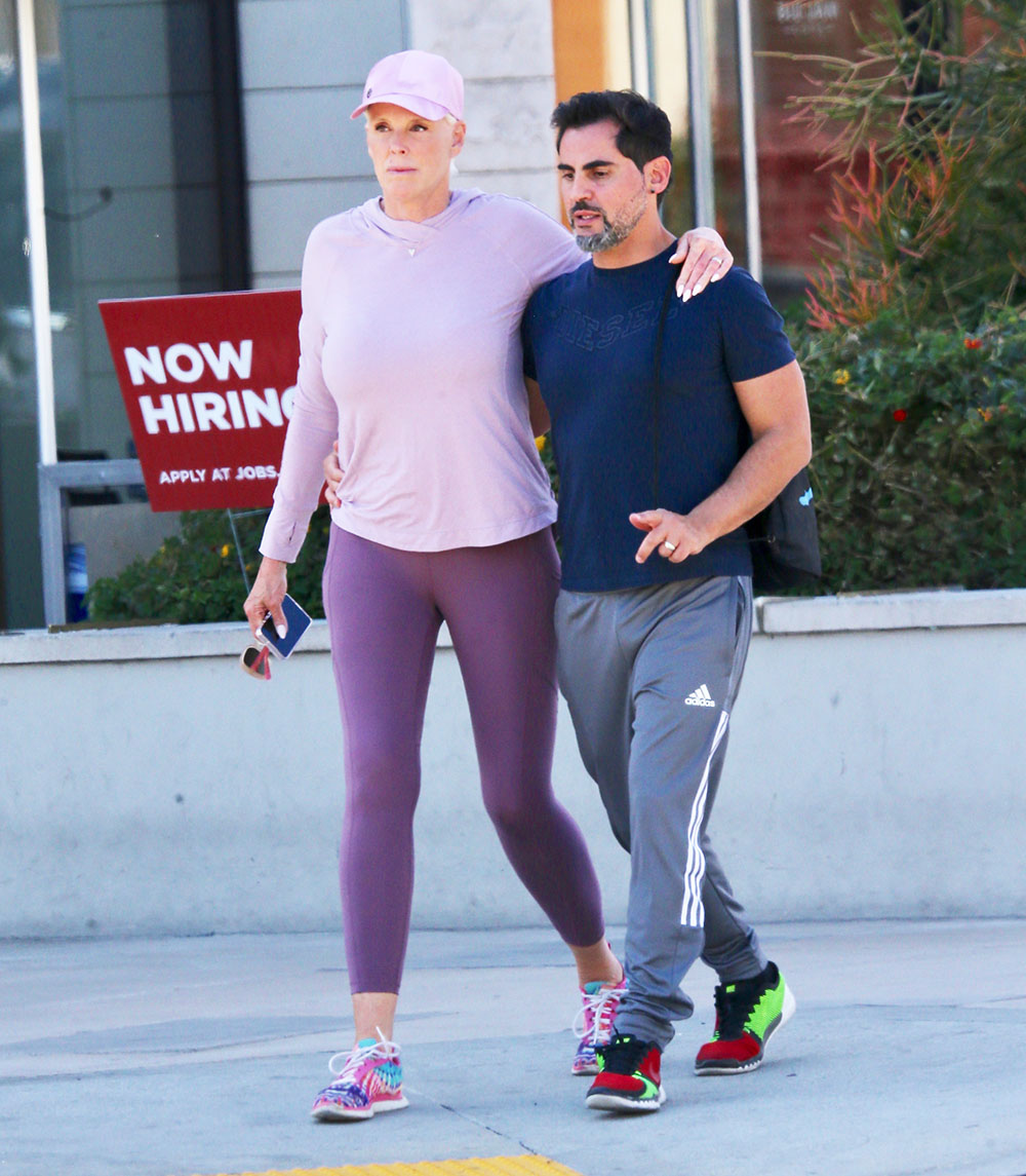 EXCLUSIVE: Brigitte Nielsen leaves Whole Foods in Studio City after having lunch with her husband. Brigitte wrapped her arm around her husband as they walked back to their vehicle. 14 Mar 2022 Pictured: Brigitte Nielsen leaves Whole Foods in Tarzana after having lunch with her husband. Photo credit: MEGA TheMegaAgency.com +1 888 505 6342 (Mega Agency TagID: MEGA838294_004.jpg) [Photo via Mega Agency]