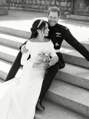 HANDOUT EDITORIAL USE ONLY/NO SALES
Mandatory Credit: Photo by Alexi Lubomirski/Kensington Palace/HANDOUT/EPA-EFE/REX/Shutterstock (9687906a)
Prince Harry and Meghan Markle
Official royal wedding photograph of Duke and Duchess of Sussex, Windsor, United Kingdom - 21 May 2018
A handout photo made available by Kensington Palace on 21 May 2018 of the official wedding photograph released by the Duke and Duchess of Sussex showing Britain's Prince Harry, Duke of Sussex and his wife Meghan, Duchess of Sussex on the East Terrace of Windsor Castle, in Winsor, Britain, 19 May 2018, after their royal wedding ceremony. 
NEWS EDITORIAL USE ONLY.  NO COMMERCIAL USE. NO MERCHANDISING, ADVERTISING, SOUVENIRS, MEMORABILIA or COLOURABLY SIMILAR. NOT FOR USE AFTER 31 DECEMBER 2018 WITHOUT PRIOR PERMISSION FROM KENSINGTON PALACE. NO CROPPING. Copyright in the photograph is vested in The Duke and Duchess of Sussex. Publications are asked to credit the photograph to Alexi Lubomirski. No charge should be made for the supply, release or publication of the photograph. The photograph must not be digitally enhanced, manipulated or modified in any manner or form and must include all of the individuals in the photograph when published.