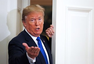 Donald J. Trump and Hock Tan
US President Donald J. Trump makes an announcement on jobs, Washington, USA - 02 Nov 2017
US President Donald J. Trump gestures to reporters following an announcement on jobs in the Oval Office of the White House, in Washington, DC, USA, 02 November 2017.