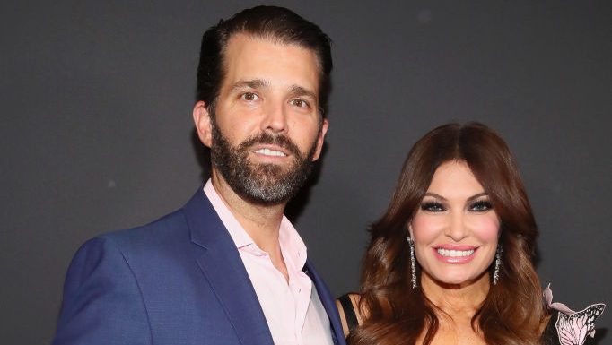 NEW YORK, NY - FEBRUARY 13:  Kimberly Guilfoyle and Donald Trump Jr. pose backstage for Zang Toi fashion show during New York Fashion Week: The Shows at Gallery II at Spring Studios on February 13, 2019 in New York City.  (Photo by Astrid Stawiarz/Getty Images for NYFW: The Shows)