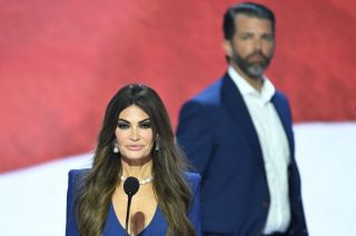 Kimberly Guilfoyle, partner of Donald Trump Jr. (R), takes part in a sound check on the second day of the 2024 Republican National Convention at the Fiserv Forum in Milwaukee, Wisconsin, July 16, 2024. Days after he survived an assassination attempt Donald Trump won formal nomination as the Republican presidential candidate and picked right-wing loyalist J.D. Vance for running mate, kicking off a triumphalist party convention in the wake of last weekend's failed assassination attempt. (Photo by ANDREW CABALLERO-REYNOLDS / AFP) (Photo by ANDREW CABALLERO-REYNOLDS/AFP via Getty Images)