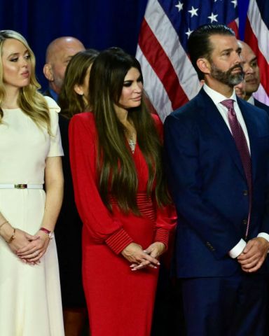 Tiffany Trump and her husband Michael Boulos, Kimberly Guilfoyle, her partner Donald Trump Jr. and his his daughter Kai Madison Trump listen to former US President and Republican presidential candidate Donald Trump speak an election night event at the West Palm Beach Convention Center in West Palm Beach, Florida, early on November 6, 2024. (Photo by Jim WATSON / AFP) (Photo by JIM WATSON/AFP via Getty Images)