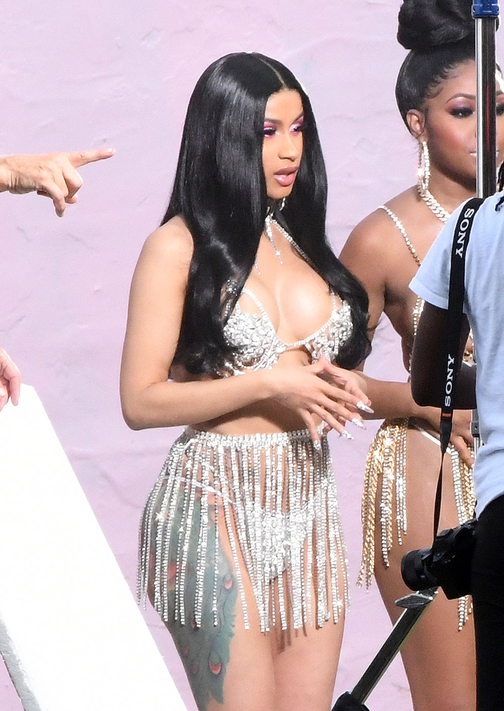 EXCLUSIVE: Cardi B. wears a very reveling rhinestone bikini, similar to one worn by rival Nikki Minaj, as she films a music video in Miami. 04 Dec 2018 Pictured: Cardi B. Photo credit: MEGA TheMegaAgency.com +1 888 505 6342 (Mega Agency TagID: MEGA318677_002.jpg) [Photo via Mega Agency]