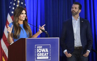 Kimberly Guilfoyle makes remarks as President Donald Trump's son Donald, Jr. listens, at a Keep Iowa Great news conference, in Des Moines, Iowa, Monday, February 3, 2020. Iowa's voters head to their first-in-the-nation caucuses today to argue for their 2020 Democratic presidential choice.Trump family members hold news conference in Des Moines Iowa, United States - 03 Feb 2020