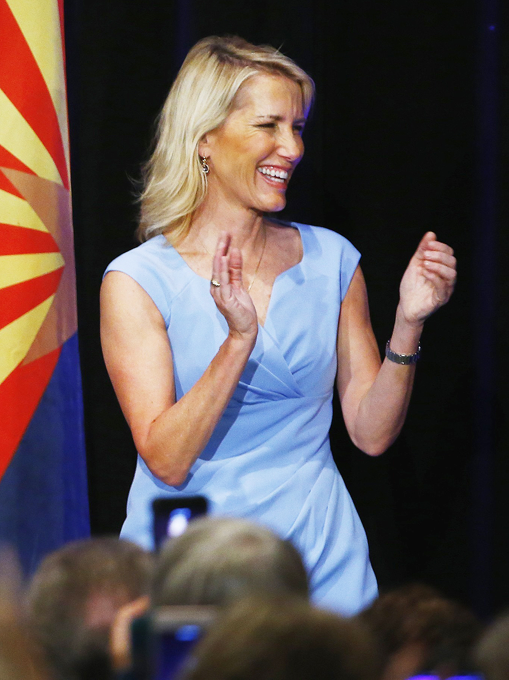 Steve Bannon, former strategist for President Donald Trump, left, joins political commentator Laura Ingraham, right, as they speak at a campaign rally for Arizona Senate candidate Kelli Ward, in Scottsdale, Ariz. Ward is running against incumbent Republican Jeff Flake in next year's GOP primary
Senate Bannon, Scottsdale, USA - 17 Oct 2017