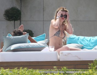Scott Disick is seen with girlfriend Bella Thorne as they sunbathe at a luxury villa in Cannes, Scott could resist squeezing Bell's Breast a the couple were seen all over each other in the sunshine.Pictured: Scott Disick, Bella ThorneRef: SPL1506975  240517  Picture by: Splash NewsSplash News and PicturesLos Angeles:310-821-2666New York:212-619-2666London:870-934-2666photodesk@splashnews.com