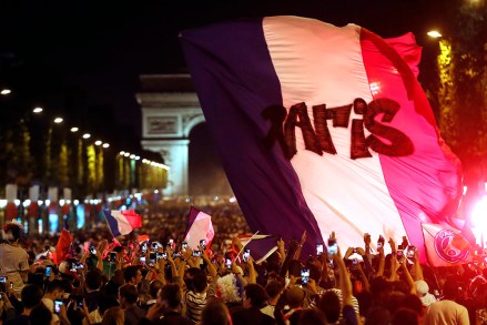 The crowd invades the Champs Elysees avenue, with the Arc de Triomphe in background, to celebrate after the semifinal match between France and Belgium at the 2018 soccer World Cup, in Paris. France advanced to the World Cup final for the first time since 2006 with a 1-0 win over Belgium on TuesdayWCup Soccer, Paris, France - 10 Jul 2018