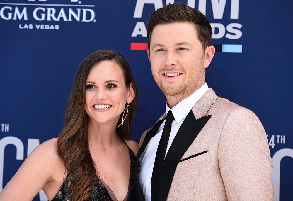 Scotty McCreery, Gabi Dugal. Scotty McCreery, right, and Gabi Dugal arrive at the 54th annual Academy of Country Music Awards at the MGM Grand Garden Arena, in Las Vegas
54th Annual Academy of Country Music Awards - Arrivals, Las Vegas, USA - 07 Apr 2019