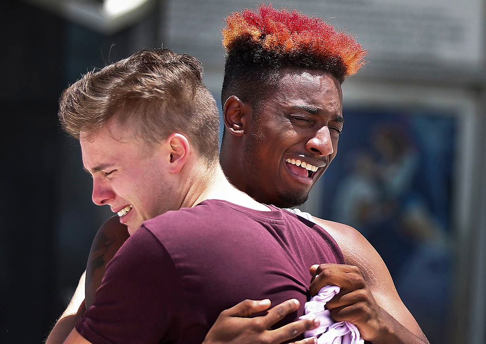 D Bouey, 21, of Orlando, Fla., right, cries with his friend after a memorial for the rapper, XXXTentacion, in Sunrise, Fla. The rapper was gunned down in a luxury sports car last week
XXXTentacion Slain, Sunrise, USA - 27 Jun 2018