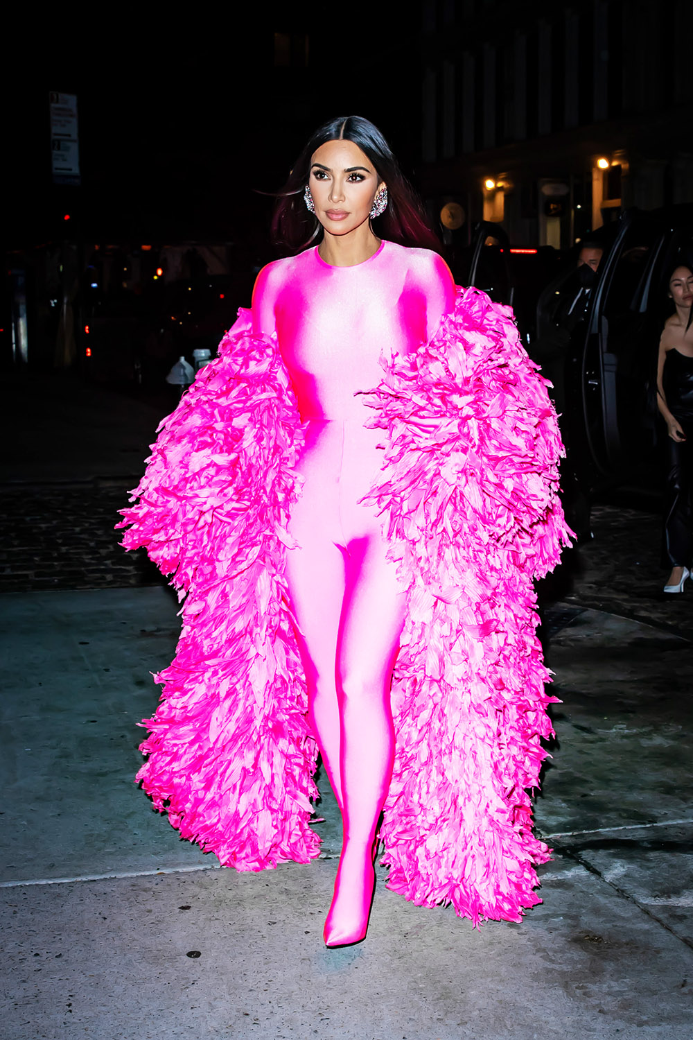 Kim Kardashian Stuns In A Hot Pink Feathered Catsuit As She Celebrates Her First Hosting Gig On SNL At Zero Bond