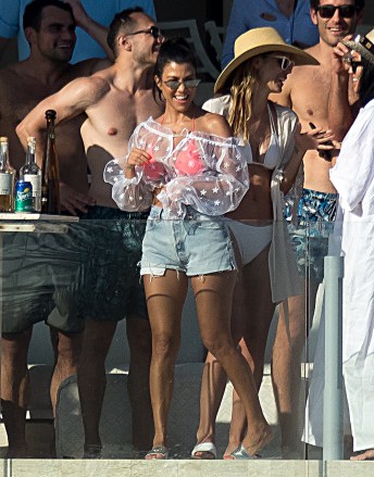 Kourtney Kardashian has fun at a pool bar in Mexico. Kourtney was laughing and joking with a group of people at a private members only beach club. Kourtney and the group were seen taking shots from ice shot glasses, which they threw into the ocean.

Pictured: Kourtney Kardashian
Ref: SPL5018470 260818 NON-EXCLUSIVE
Picture by: SplashNews.com

Splash News and Pictures
Los Angeles: 310-821-2666
New York: 212-619-2666
London: 0207 644 7656
Milan: +39 02 4399 8577
Sydney: +61 02 9240 7700
photodesk@splashnews.com

World Rights