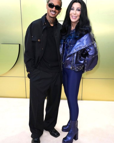 Alexander Edwards, left, and Cher arrive at the Versace Fall/Winter collection presentation, at the Pacific Design Center in West Hollywood, Calif
Versace Fall/Winter 2023 - Arrivals, West Hollywood, United States - 09 Mar 2023