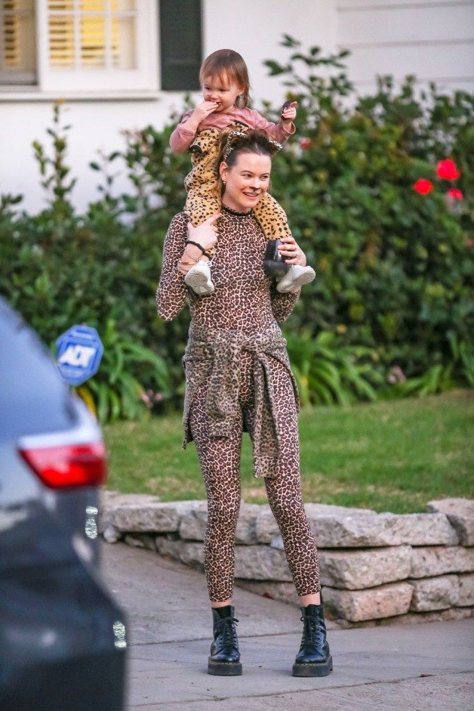 Behati Prinsloo takes daughter Dusty trick-or-treating