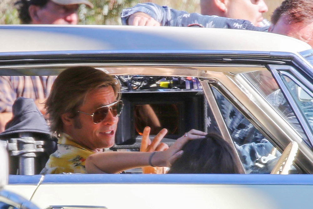 *EXCLUSIVE* Brad Pitt and Margaret Qualley seen behind the scenes as they film "Once Upon a Time in Hollywood"