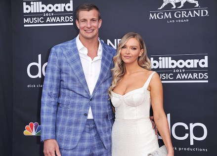 Rob Gronkowski, left, and Camille Kostek arrive at the Billboard Music Awards on Wednesday, May 1, 2019, at the MGM Grand Garden Arena in Las Vegas. (Photo by Richard Shotwell/Invision/AP)