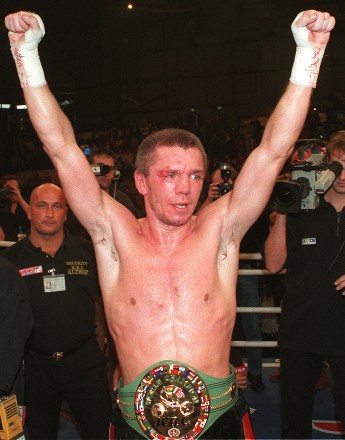 ROCCHIGIANI CHEERING German boxer Graciano Rocchigiani raises his arms after winning the vacant light heavyweight WBC championship boxing title versus American boxer Michael Nunn, Los Angeles, in the "Max-Schmeling-Sporthalle" in Berlin, Germany, Saturday night, . Rocchigiani won on points after 12 roundsBER101 GERMANY BOXING WBC, BERLIN, Germany