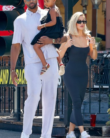 Calabasas, CA  - *EXCLUSIVE* Khloe Kardashian and Tristan Thompson exit with Kris Jenner after a pre-Father’s Day family lunch at Sagebrush Cantina in Calabasas.

Pictured: Khloe Kardashian and Tristan Thompson

BACKGRID USA 19 JUNE 2022 

USA: +1 310 798 9111 / usasales@backgrid.com

UK: +44 208 344 2007 / uksales@backgrid.com

*UK Clients - Pictures Containing Children
Please Pixelate Face Prior To Publication*